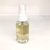Spray senteur Corse dans une bouteille en verre avec une étiquette couleur blanche ou il est écrit canistrelli avec un bouchon blanc.