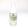 Spray senteur Corse dans une bouteille en verre avec une étiquette couleur blanche ou il est écrit ficu avec un bouchon blanc.